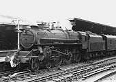 Ex-LMS 5MT 4-6-0 No 44687 is seen fitted with Caprotti valve gear and with a high running plate 	as it heads an up express service to Euston