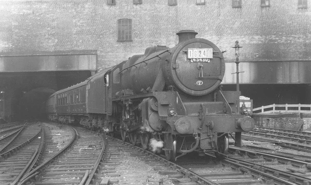 Ex-LMS 5MT 4-6-0 No 45430, sporting shed plate 21D and reporting number 1G24, is seen entering Platform 4 at the head of a Euston to Wolverhampton express service