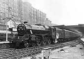 Ex-LMS 5MT 4-6-0 No 45034 is seen standing at platform 5 with a down express to the North of England
