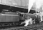 British Railways Standard Class 7 4-6-2 No 70017 'Arrow'  stands at the East end of Platform 5 with an up express