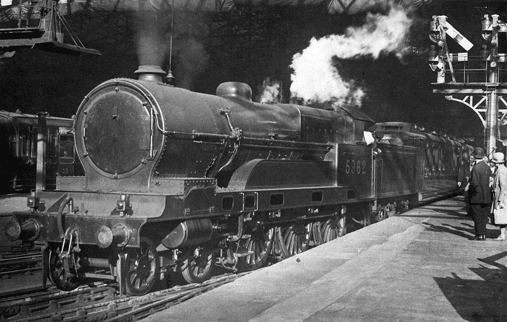 Ex-LNWR 4-6-0 'Large boilered' Claughton class No 5962 has just been given the 'off' as it starts away from Platform 3 with a Liverpool express service