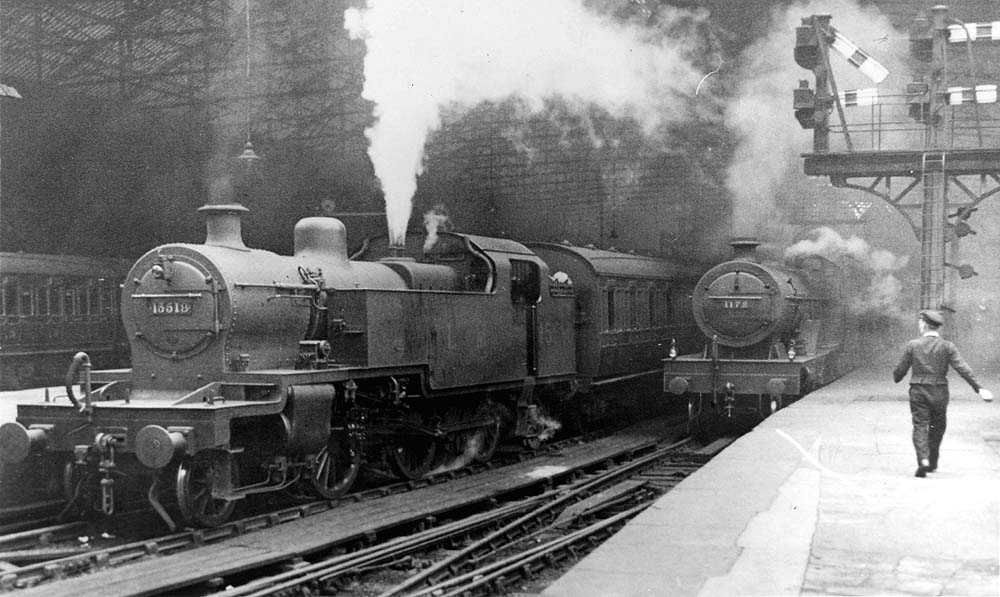 LMS 3MT 2-6-2T No 15518 is seen standing at the West end of Platform 2 at the head of a New Street to Wolverhampton local passenger service