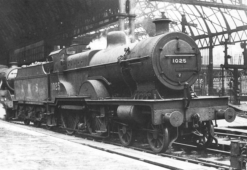 Ex-MR 4P 4-4-0 Compound No 1025 is seen reversing back on the middle road between Platforms 5 and 6 ready to couple up to an unidentified LMS 4-6-0 'Black 5'