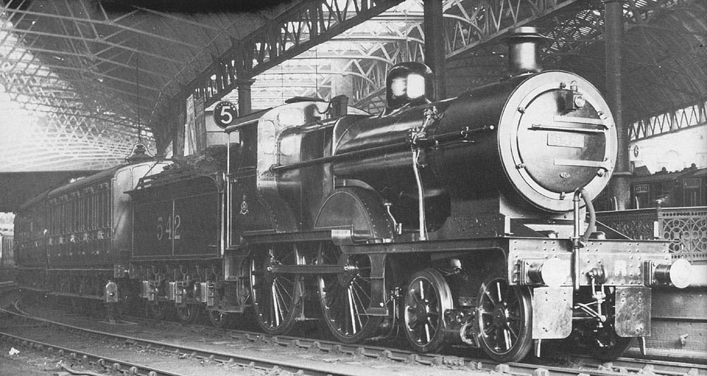 Midland Railway 2P 4-4-0 No 542 is seen standing at Platform 5 whilst at the head of a Class 'B' working, an up local passenger train to Leicester