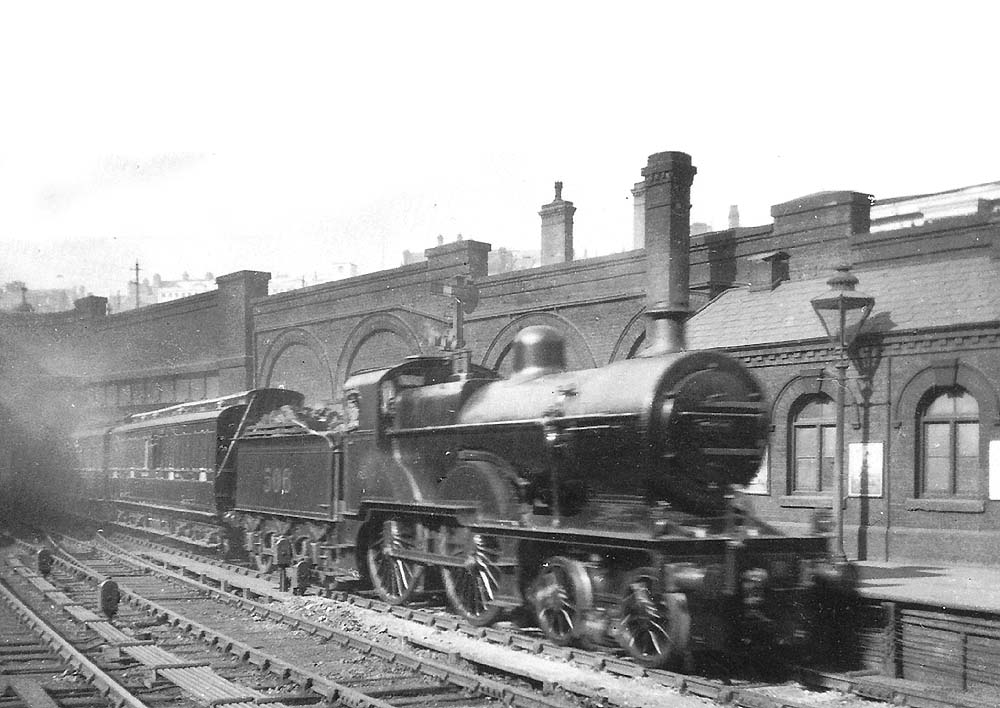 Midland Railway 2P No 506 is seen emerging from below Hill Street bridge as it enters Platform 4 whilst at the head of an up express from the Gloucester direction