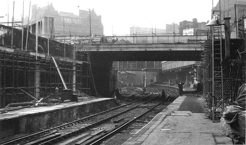 Looking West along Platform 1 towards New Street No 5 Signal Box during the construction of the new station on 2nd April 1964