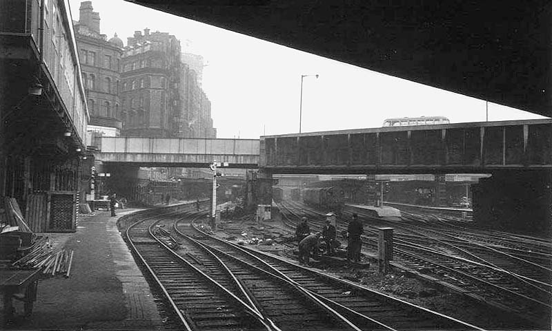 Looking East from beneath Hill Street bridge along Platform 1 with the Queen's Hotel towering above the station on 2nd April 1964