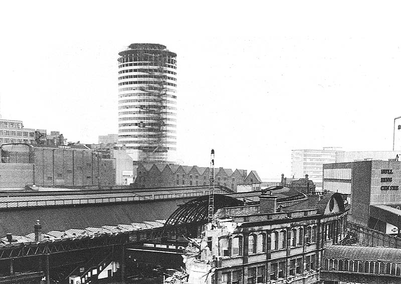 An elevated view of the demolition of the main station building on Midland portion of New Street station with Rotunda rising in the background