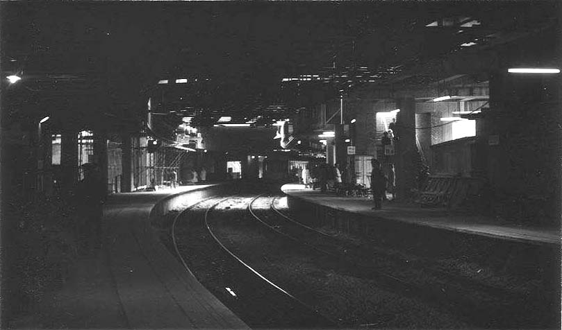 Looking West along the newly built Platform 12 from the Coventry end of the station whilst a DMU can be seen arriving at Platform 11 on 22nd May 1965