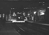 Looking West along the newly built Platform 12 from the Coventry end of the station whilst a DMU can be seen arriving at Platform 11 on 22nd May 1965
