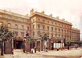 A coloured postcard looking from Stephenson Place showing the entrance to the private road in front of the Queen's & North Western Hotel