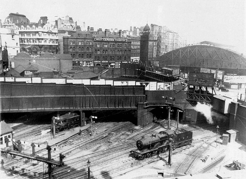 An aerial view of the West end of New Street station showing the trackwork approaching to the station and part of the turntable