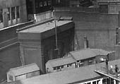 Close up showing the water tank and Permanent Way buildings erected behind New Street No 5 Signal Box and adjacent to Hill Street