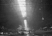 View of New Street station's centre lantern light and ventilation section being removed in 1945