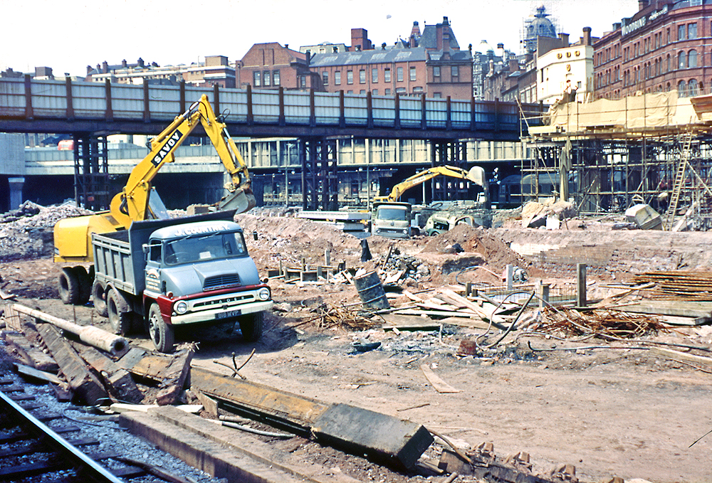 View of the demolition work being carried out on the site of the original 1851 station with Navigation Street bridge in the distance
