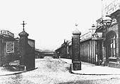 Entrance to Queens Drive from the southern end, opposite the Market Hall, with the MR parcels office on the left