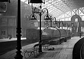 Close up of platform 2 showing the row of ornate cast-iron pairs of lamps which was the LNWR's method of providing light  New Street station