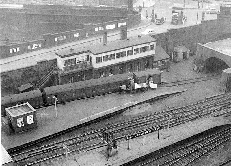 An aerial view from the Queens Hotel of the West end of New Street station with Queens Drive behind and Navigation Street bridge to the right on 19th March 1961