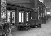 Close up of Platform 4 showing a variety of platform trollies and on the extreme left, for carriage oil lamps