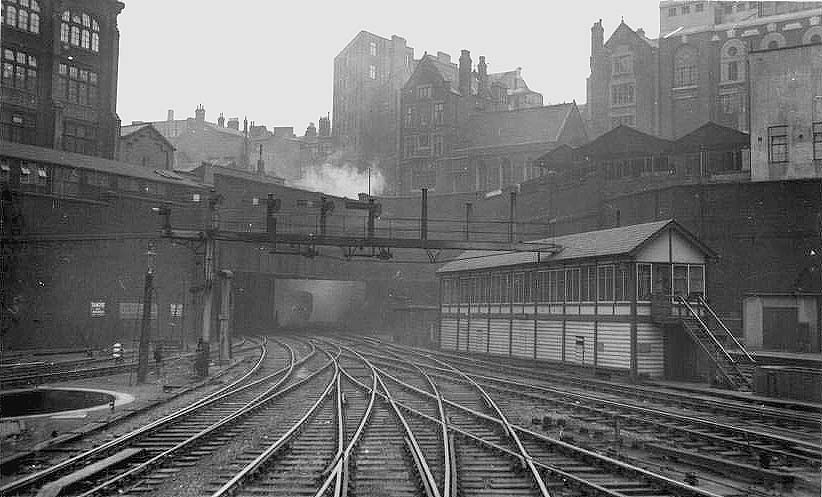 Looking West from under Navigation Street bridge towards the smoke filled tunnel that commenced at Suffolk Street with New Street No 5 Signal Cabin to the right