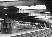 Looking East along Platform 6 beneath the 'temporary' canopy structure towards Coventry in 1963