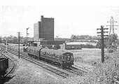 Metro-Cammell two-car Diesel Multiple Unit passes New Bilton Wharf Public Sidings on 26th June 1960