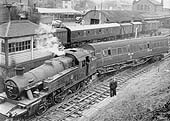 Ex-LMS 3MT 2-6-2T No 40135 is seen with a derailed 57 ft ex-LMS brake adjacent to Coventry No 2 Signal box on 21st November 1959