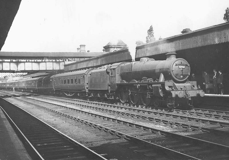 Ex-LMS 4-6-0 Jubilee class No 5742 'Connaught' is seen arriving at platform one in Coventry with an up express service