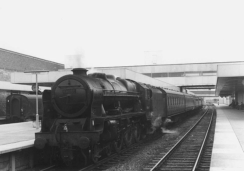 Ex-LMS 4-6-0 rebuilt Royal Scot class No 46149 'The Middlesex Regiment' stands at Coventry station's new platform two on a up express service