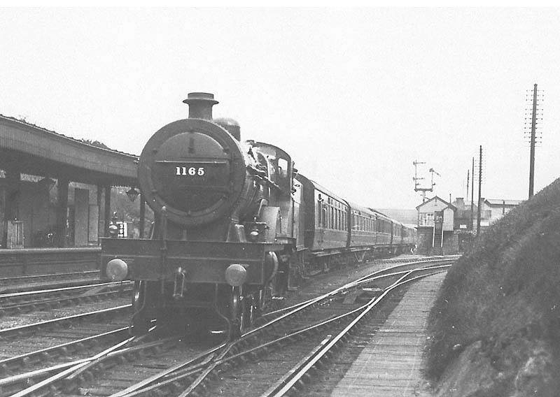 LMS 4-4-0 4P Compound No 1165 is seen entering Platform 2 on one of the famed 'two-hour' Euston to Birmingham express services