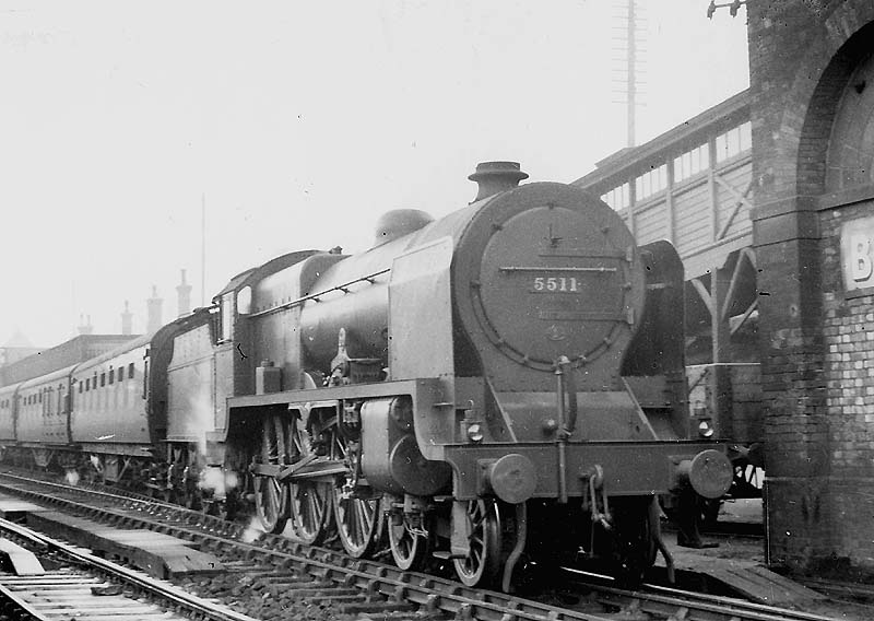 LMS 4-6-0 5XP Patriot class No 5511 'Isle of Man' is seen standing at platform two at the head of a Euston to Wolverhampton service