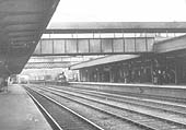View looking towards Birmingham as a LNWR 0-6-0 Cauliflower heads a passenger train into the up platform