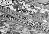Close up showing the down sidings, located on the Nuneaton branch, with a mixture of both loaded and empty wagons as well as four carriages