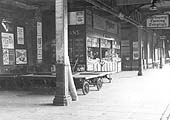 View of the London end of the up platform's concourse partly occupied by the kiosk of Wymans the newsagents