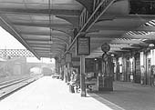 Looking towards Birmingham along the up platform concourse with Warwick Road bridge in the distance