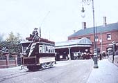 View of Coventry Station's main entrance looking from Eaton Road with a tram standing at the terminus