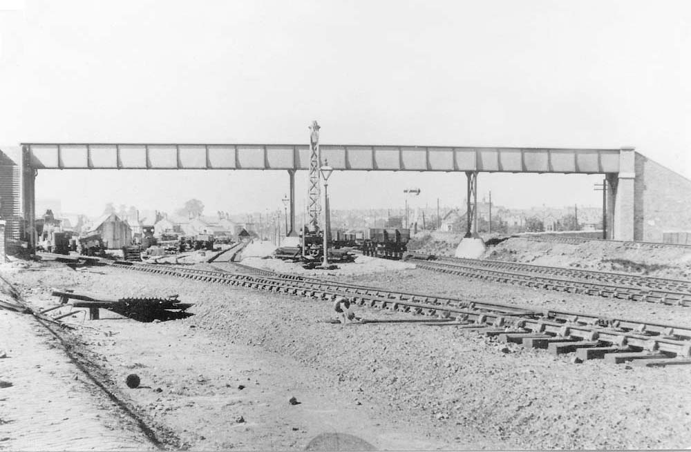 View of the throat of Gosford Green goods yard during construction and the footbridge provided for pedestrians