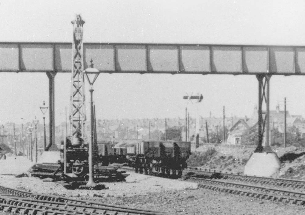 Close up of the right hand side of the goods yard showing the gas lampposts and the hand-operated fixed crane located in the centre of the goods yard