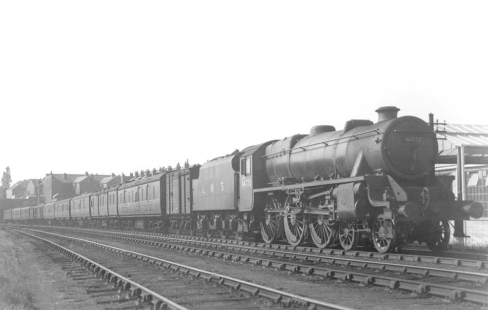 Ex-LMS 4-6-0 'Black 5' No 44773 is seen at the head of an empty parcels train as it  transits the Coventry Loop Line