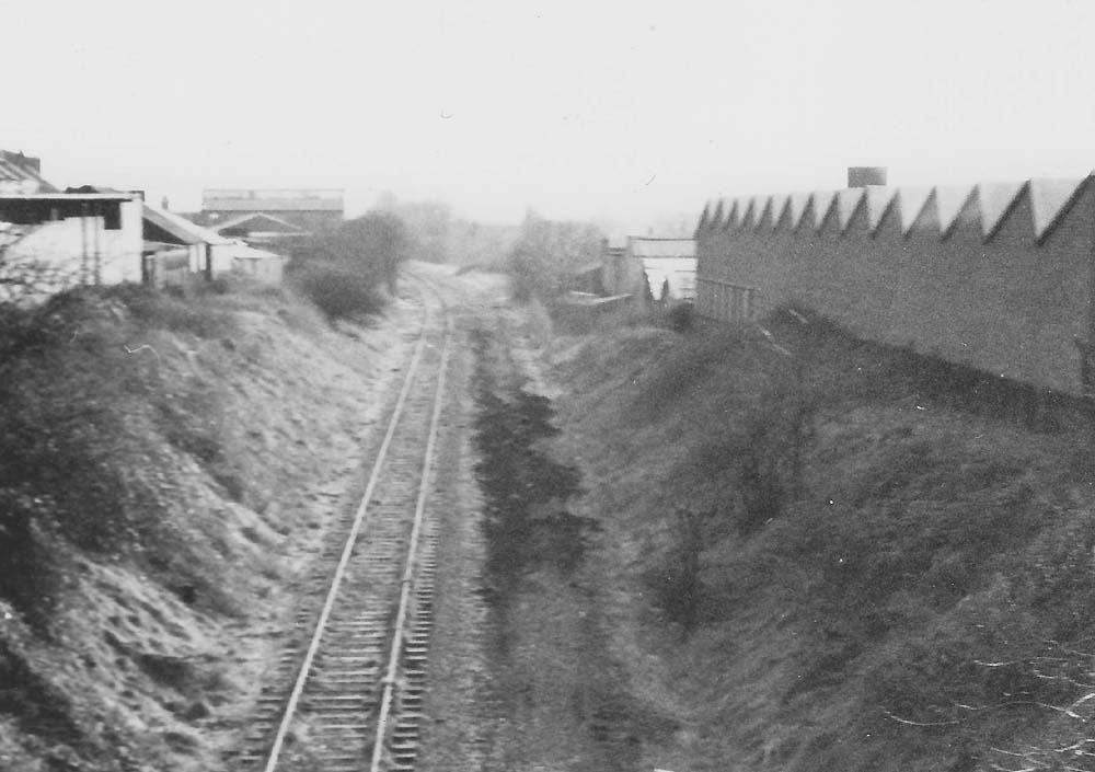 View looking south from Caludon Road bridge along the part lifted line towards Gosford Green