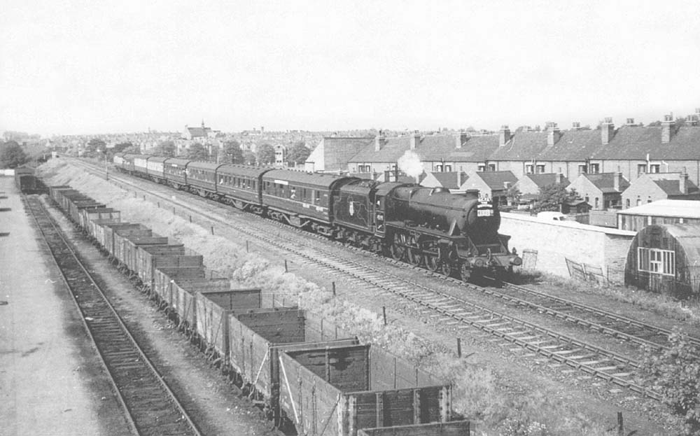 Ex-LMS 5MT 4-6-0 No 45091 is seen passing Gosford Green goods yard on a RCTS special, 'The Mercian' on 2nd June 1957