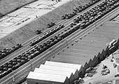 A close up of the 1929 aerial view of the sidings showing the guards van at the rear of the down goods train arriving on the loop lines