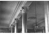 View of the top of the ornate columns and coved ceilings provided within the restaurant of the Queen Victoria's hotel