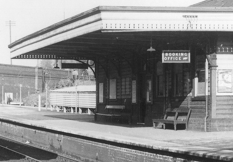 Close up showing the limited passenger facilities on Four Oaks' down platform and behind the cycle shed