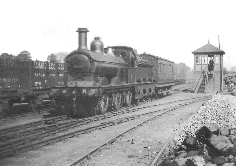 An unidentified Midland Railway 2F 0-6-0 locomotive is seen on what is thought to be the Hampton to Whitacre train