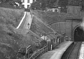 An unidentified LNWR 2-4-0 'Jumbo' class locomotive is seen departing from Handsworth Wood station