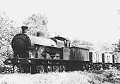 Ex-LNWR 0-8-0 'Super D' No 9345 passes through Handsworth Park at the head of a train of mineral wagons