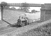 LNWR 0-8-0 No 1279 is running fast on a down empty mineral train south of Folley Lane bridge circa 1910