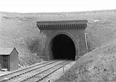 Looking towards Weedon through the northern portal of Kilsby tunnel with a brick built P&W hut on the left