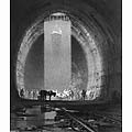 Inside Kilsby Tunnel showing a loaded railway wagon being winched up a ventilation shaft, so that the spoil can be dumped